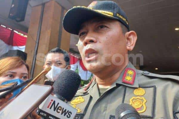 21763 kepala satpol pp dki arifin
