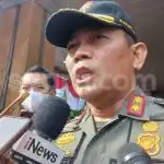 21763 kepala satpol pp dki arifin